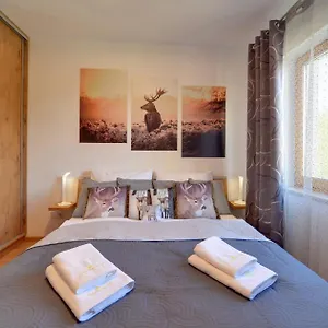 https://apartament-pod-jeleniem.karpacz-hotel.com